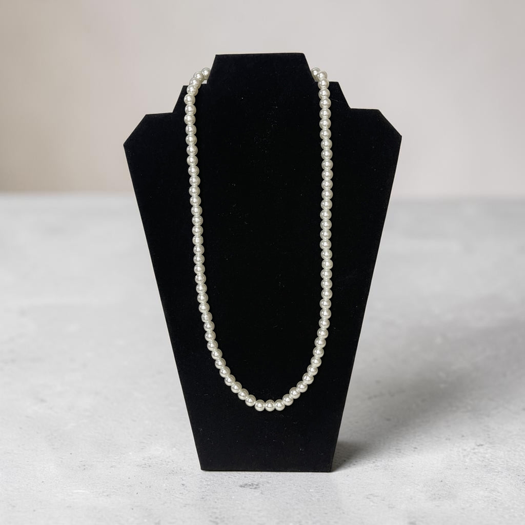 Long pearl necklace